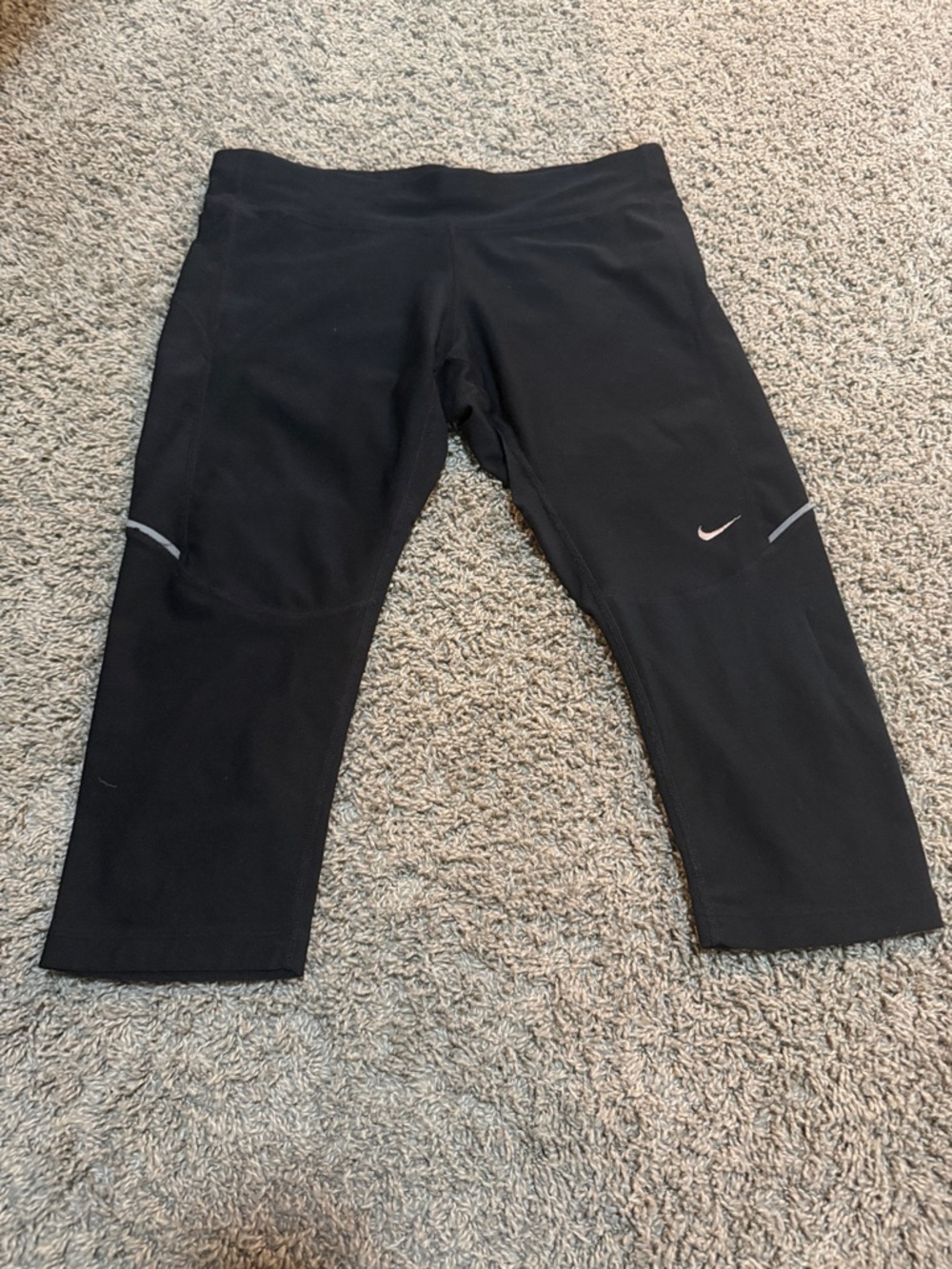 Nike Black Capri Leggings with Swoosh and Reflective Trim